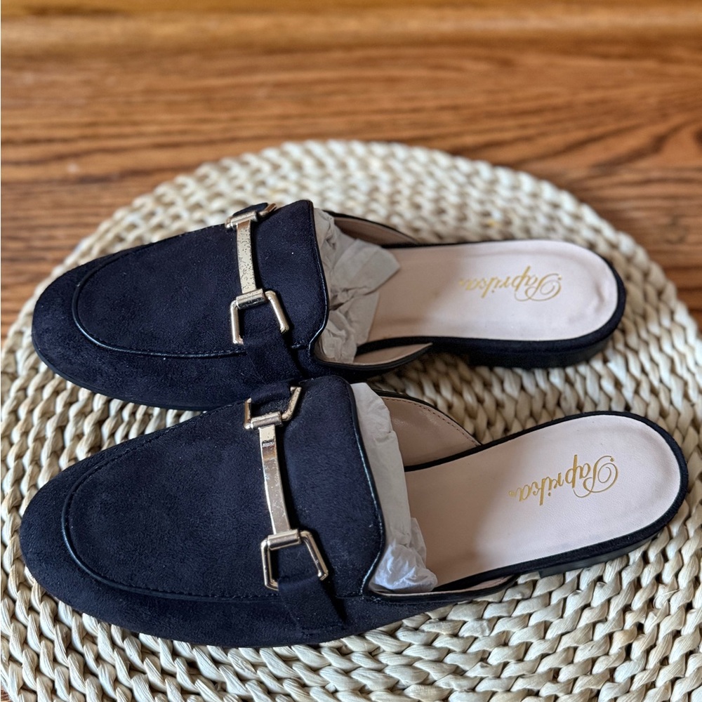Paprika black faux suede buckle mules
US size 7,5 and 7